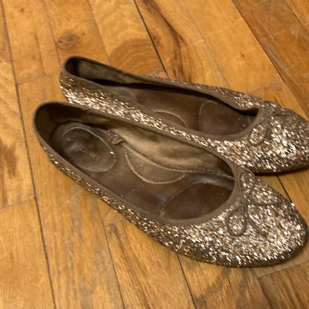 Glittery gold flats